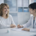 Korean medical coordinator consulting with a foreign patient in a clinic, personalized healthcare assistance in Korea